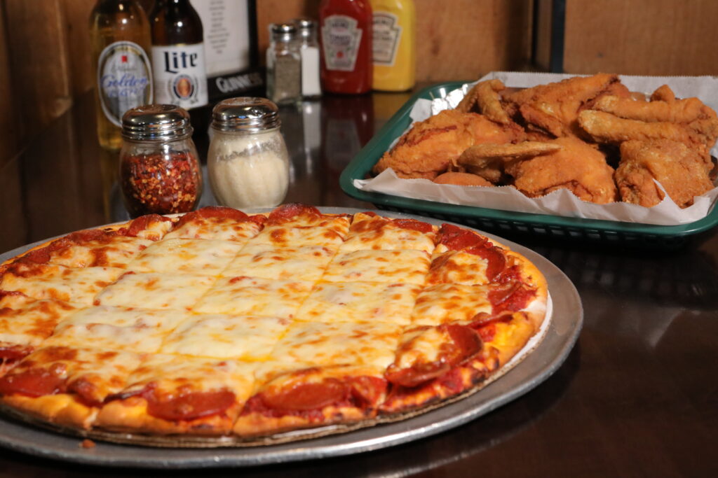 Monday Pizza and Wings special at Skinners Pub